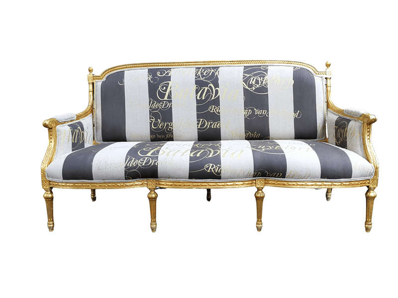 A French Antique Hand-Carved And Gilded Settee, Upholstered In A Hand Painted Imported Linen Fabr...