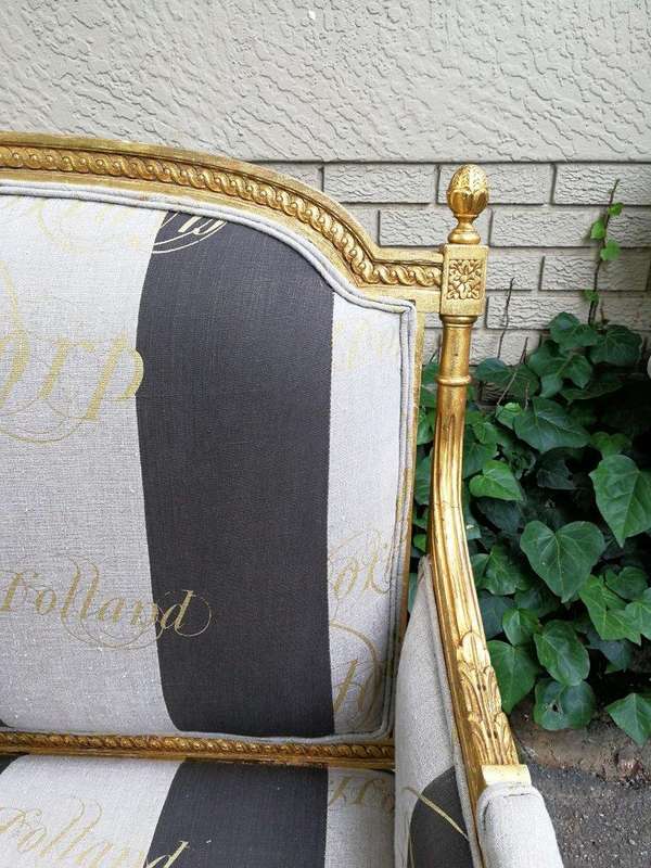 A French Antique Hand-Carved And Gilded Settee, Upholstered In A Hand Painted Imported Linen Fabr...
