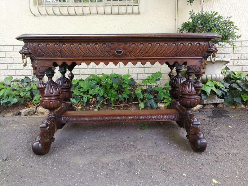 A 19th Century Circa 1879 French Dauphine/Dolphin Carved Oak Desk or Library/DrinksTable with Drawer