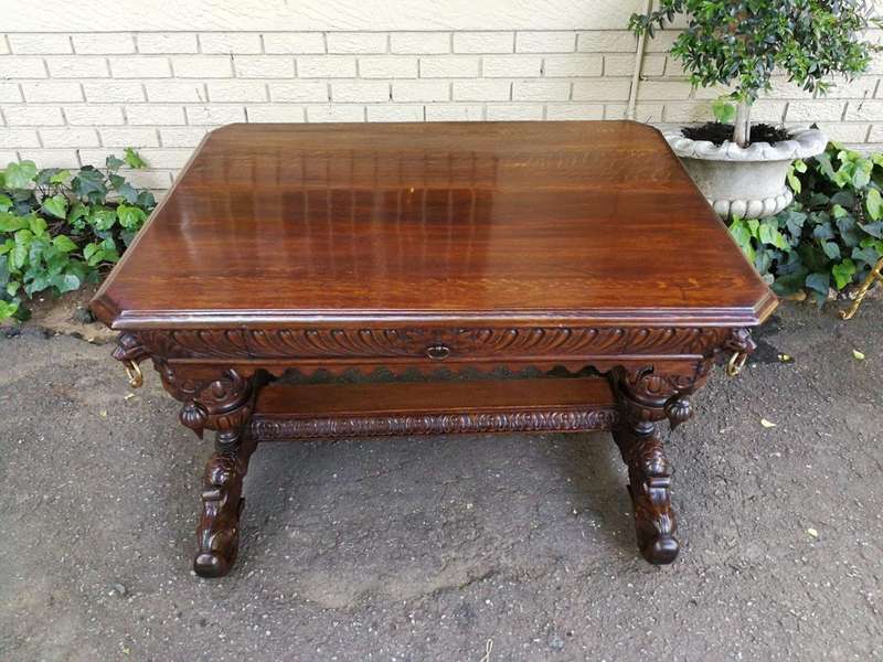 A 19th Century Circa 1879 French Dauphine/Dolphin Carved Oak Desk or Library/DrinksTable with Drawer