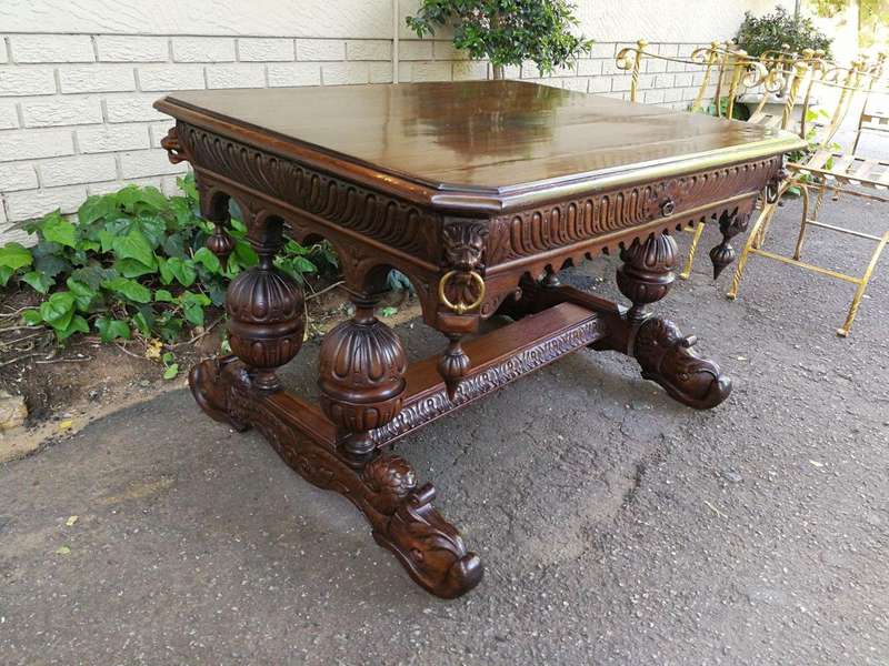 A 19th Century Circa 1879 French Dauphine/Dolphin Carved Oak Desk or Library/DrinksTable with Drawer