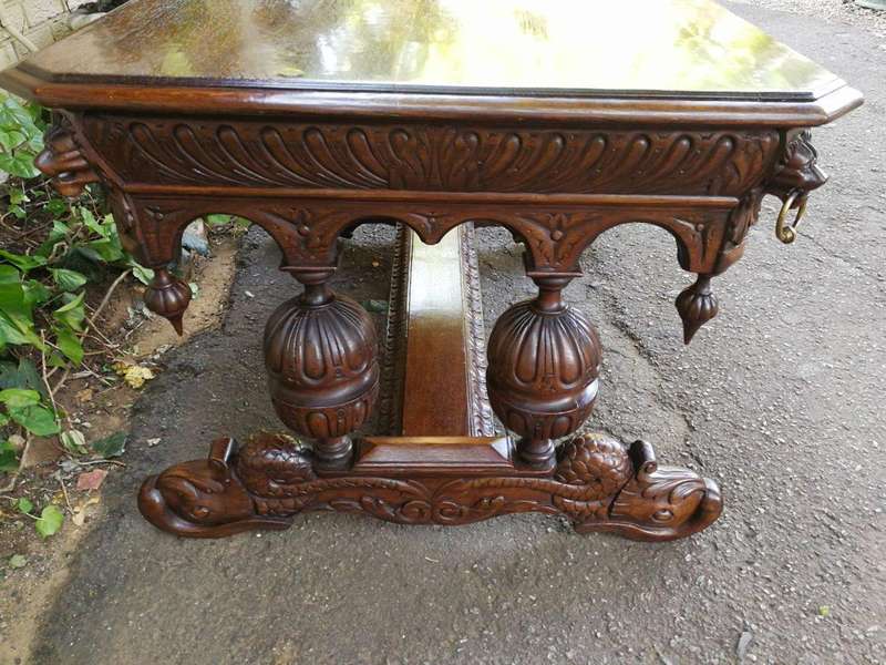 A 19th Century Circa 1879 French Dauphine/Dolphin Carved Oak Desk or Library/DrinksTable with Drawer