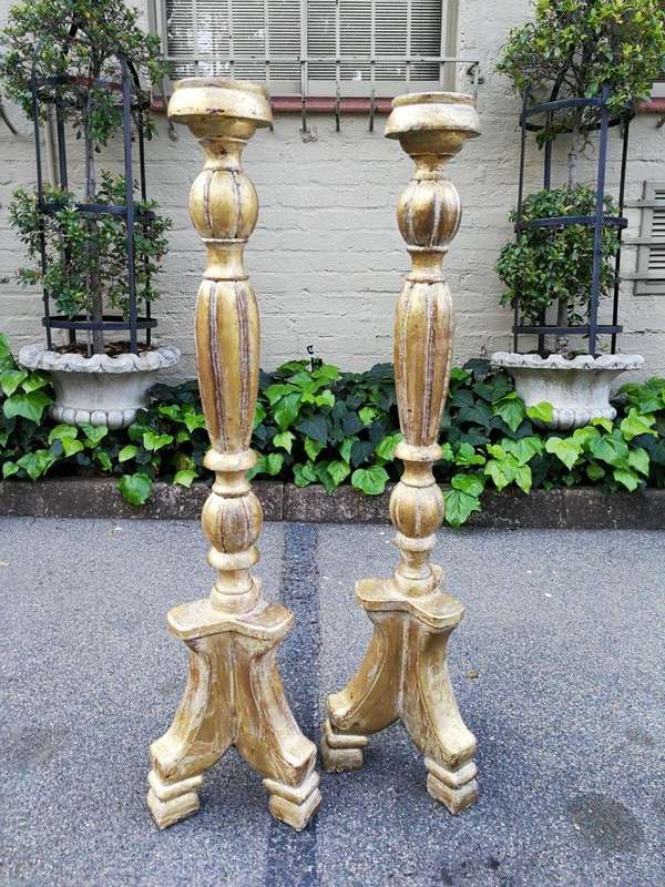 A Pair Of Carved Wooden Candle Holders Hand Gilded With Gold Leaf