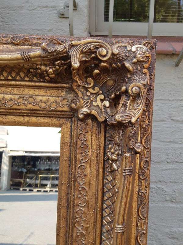 Large gilt-painted bevelled mirror