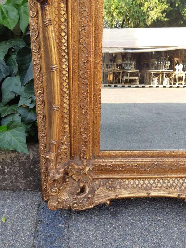 Large gilt-painted bevelled mirror