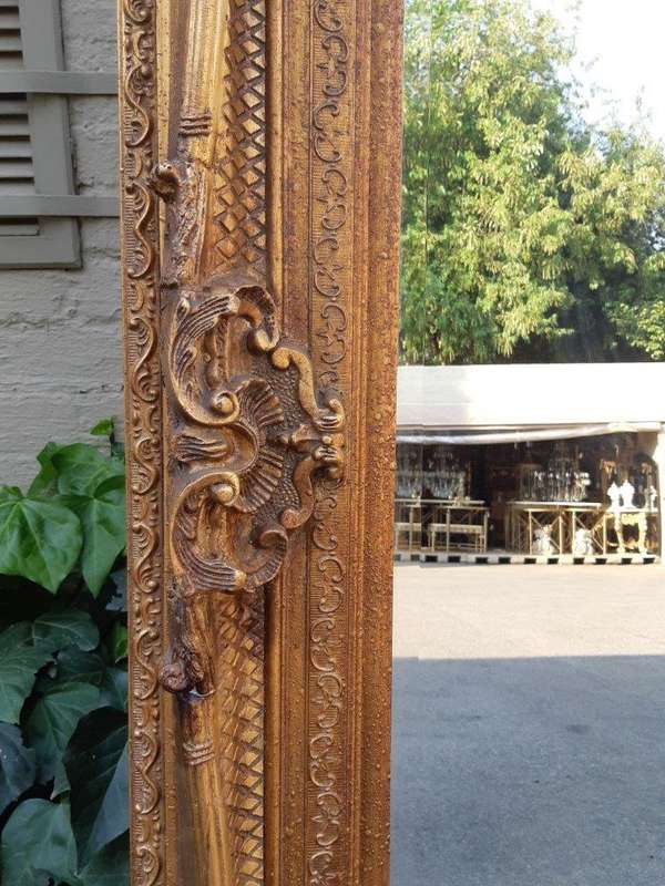 Large gilt-painted bevelled mirror