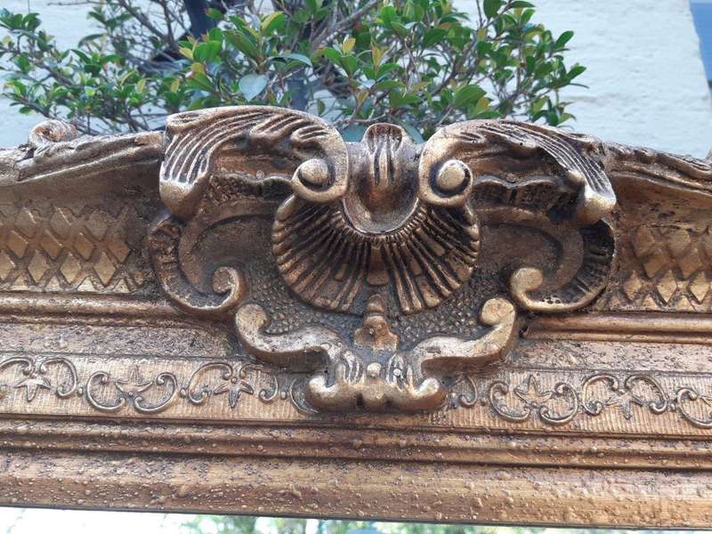 Large gilt-painted bevelled mirror