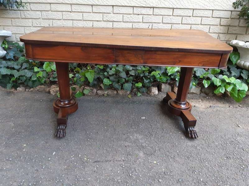William IV rosewood library table, with two graduating drawers