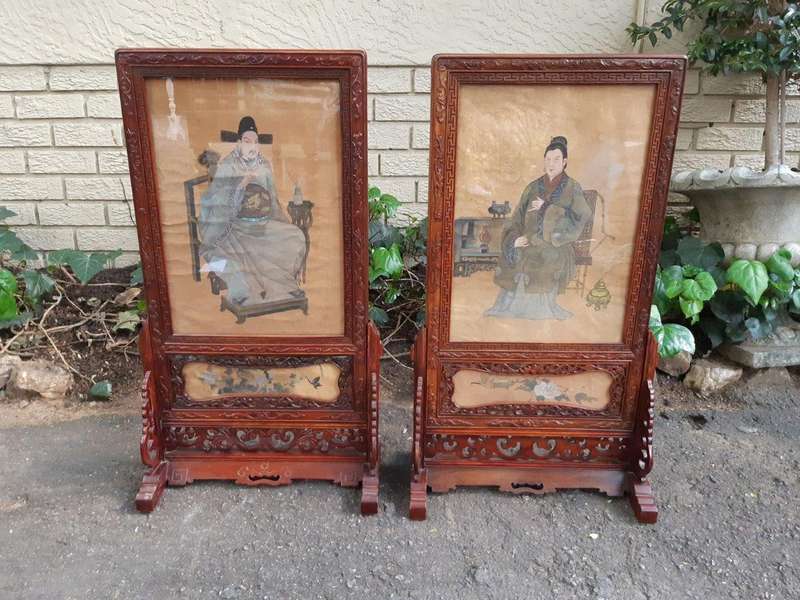A Rare Pair of Late 19th Century Chinese Portraits on Silk in Chinese Wooden Carved Standing Frames