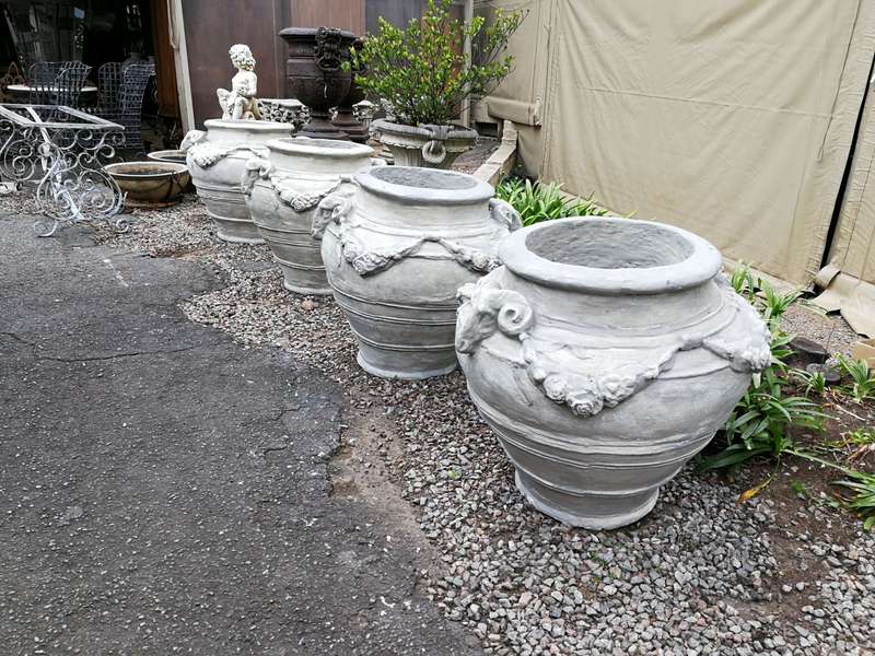 A Set of Four (4) VERY LARGE hand-painted concrete rams heads jardinieres/urns