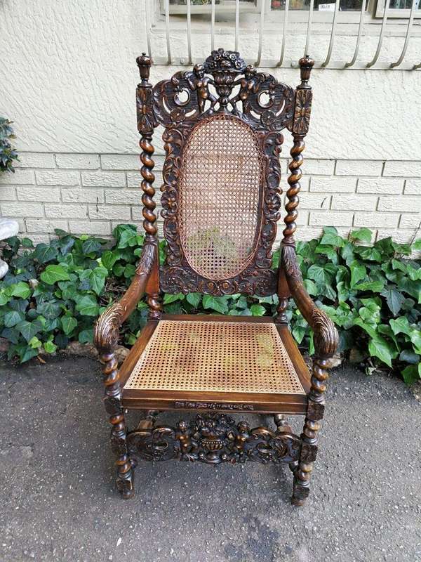 19th Century Ornately Carved Flemish Throne Chair With Rattan Back And Seat