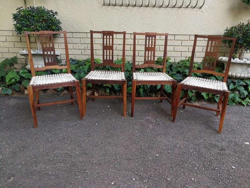 A Set Of Four (4) Bleached / Natural Mid Century Wood Riempie Chairs