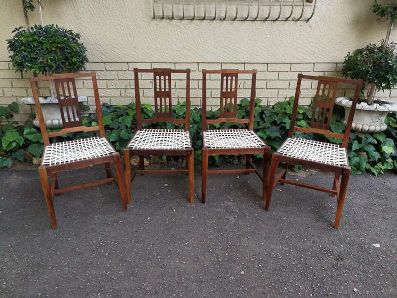 A Set Of Four (4) Bleached / Natural Mid Century Wood Riempie Chairs