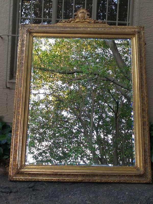 A Massive And Ornately Framed Gilded Mirror With Bevelled Mirror - ND
