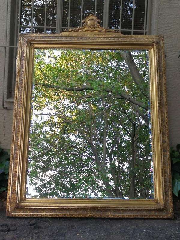 A Massive And Ornately Framed Gilded Mirror With Bevelled Mirror - ND