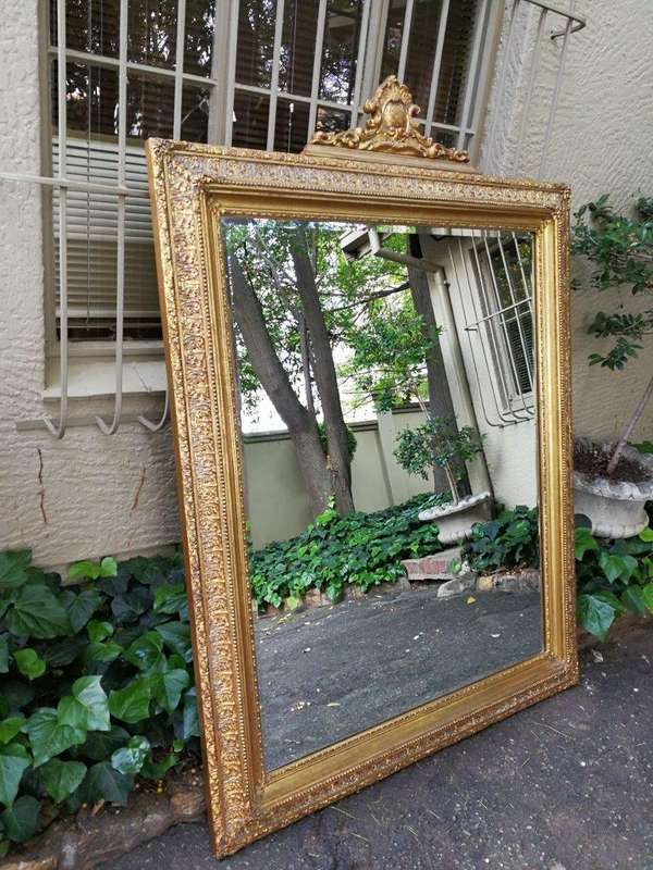 A Massive And Ornately Framed Gilded Mirror With Bevelled Mirror - ND