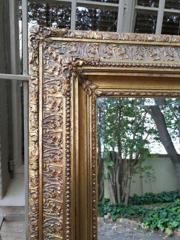 A Massive And Ornately Framed Gilded Mirror With Bevelled Mirror - ND
