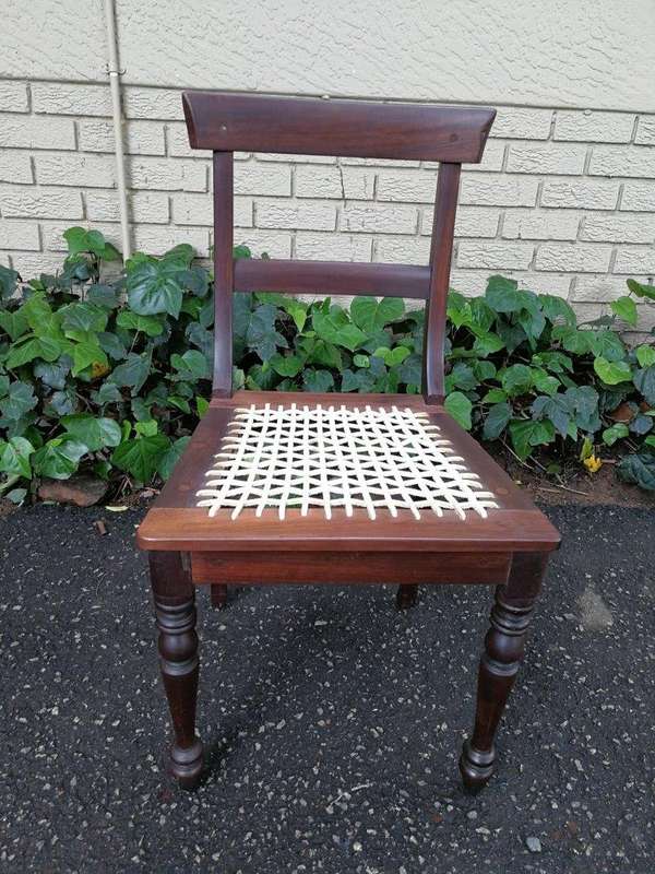 A Pair Of Cape Regency Stinkwood Chairs