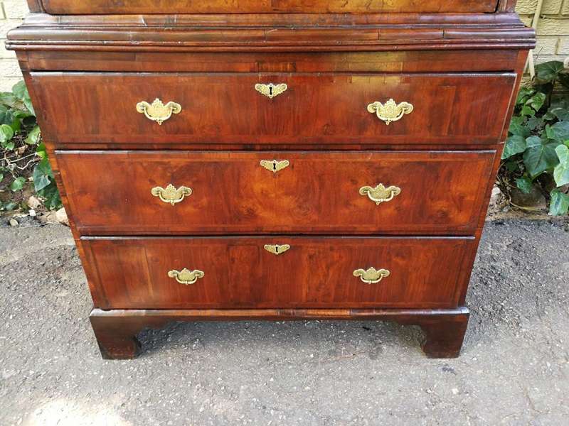A George III Walnut Chest-On-Chest