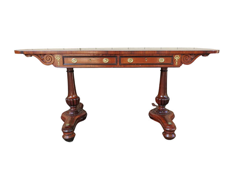 A Regency Rosewood Sofa Table With Brass Castors