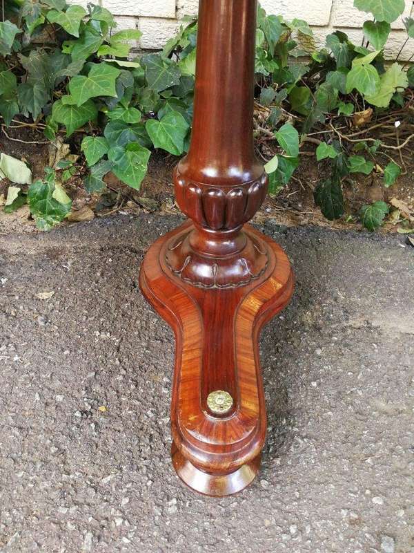 A Regency Rosewood Sofa Table With Brass Castors