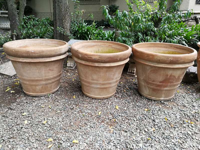 A Set Of Three Large Size French Imported Terracotta Pots/Planters