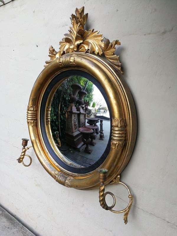 A 19th Century Regency Style Convex Giltwood Mirror
