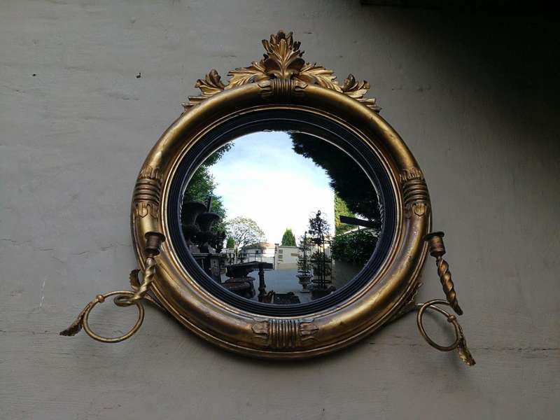 A 19th Century Regency Style Convex Giltwood Mirror