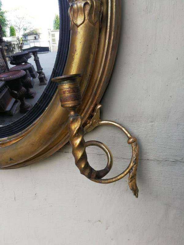 A 19th Century Regency Style Convex Giltwood Mirror
