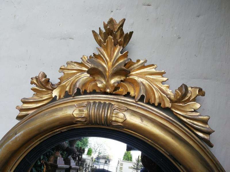 A 19th Century Regency Style Convex Giltwood Mirror