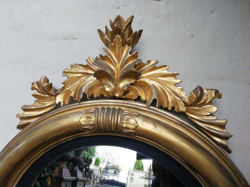 A 19th Century Regency Style Convex Giltwood Mirror