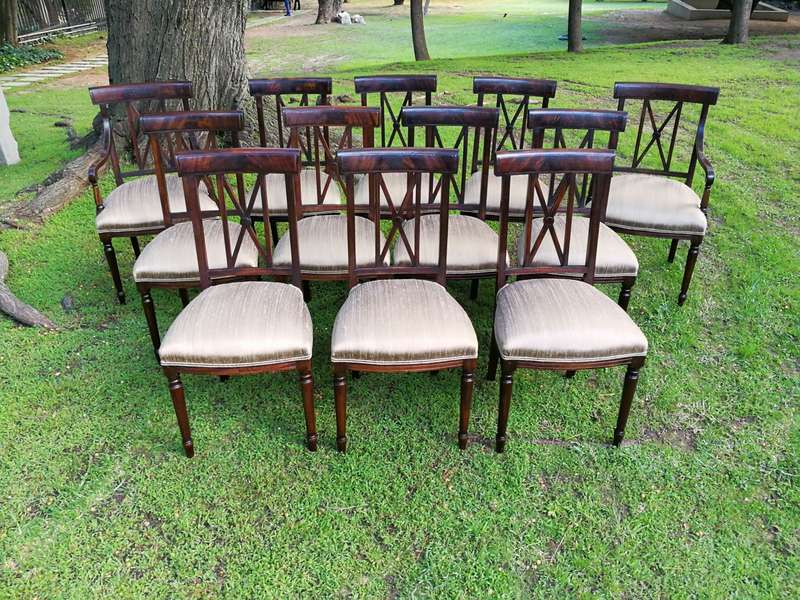 A Set Of Twelve George III Style Mahogany Dining Chairs Comprising Of Ten Chairs And Two Carvers