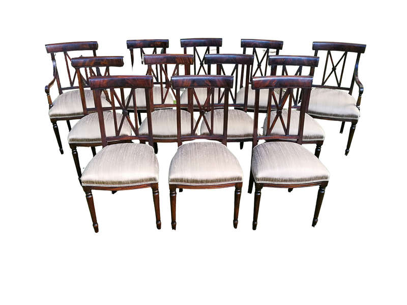 A Set Of Twelve George III Style Mahogany Dining Chairs Comprising Of Ten Chairs And Two Carvers
