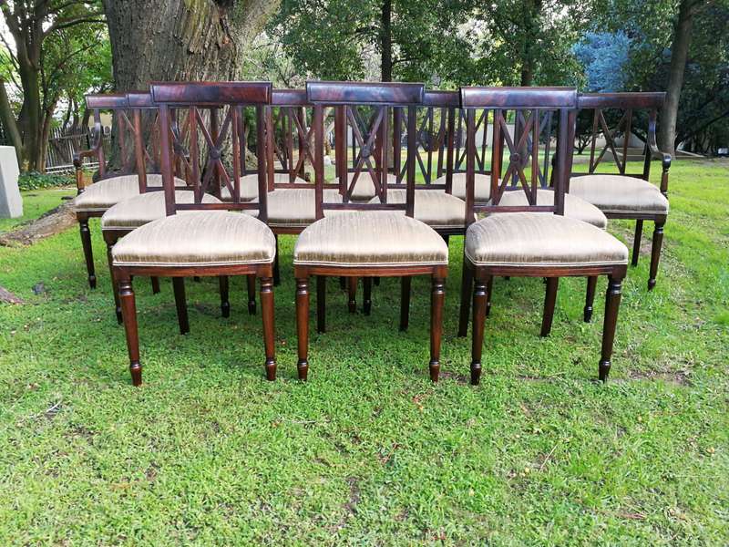 A Set Of Twelve George III Style Mahogany Dining Chairs Comprising Of Ten Chairs And Two Carvers