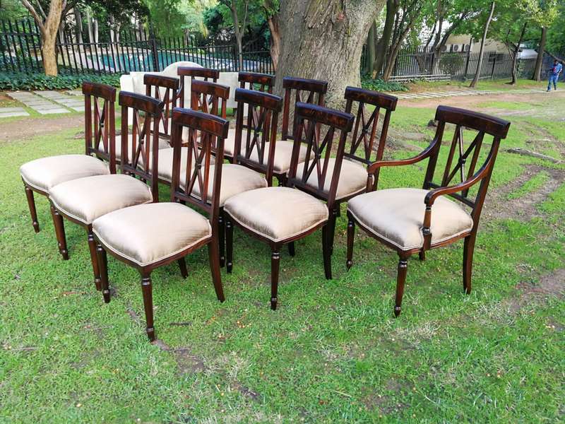 A Set Of Twelve George III Style Mahogany Dining Chairs Comprising Of Ten Chairs And Two Carvers