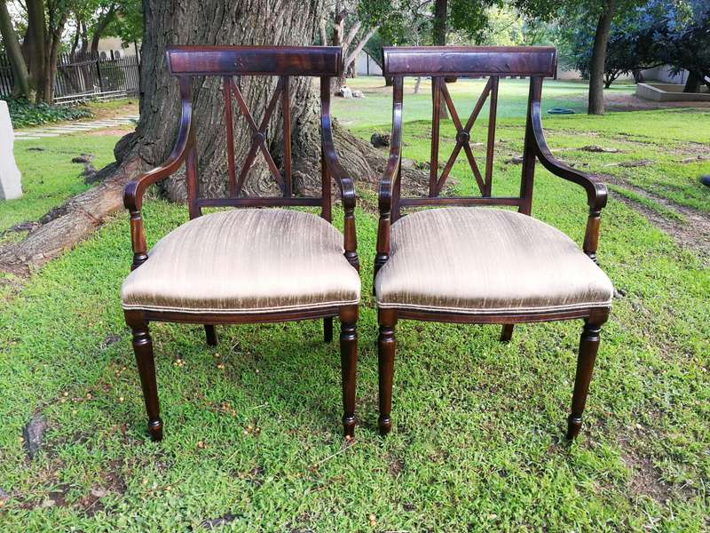 A Set Of Twelve George III Style Mahogany Dining Chairs Comprising Of Ten Chairs And Two Carvers