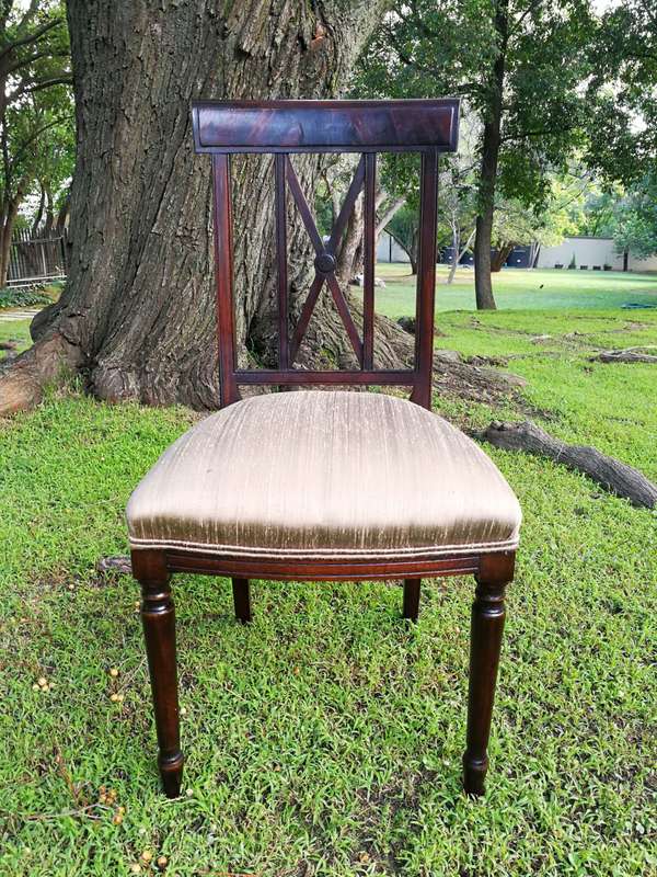 A Set Of Twelve George III Style Mahogany Dining Chairs Comprising Of Ten Chairs And Two Carvers