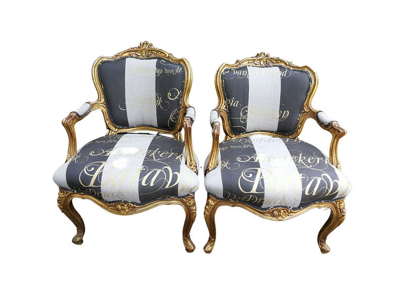 A Pair Of Carved And Gilded French Louis XV Chairs