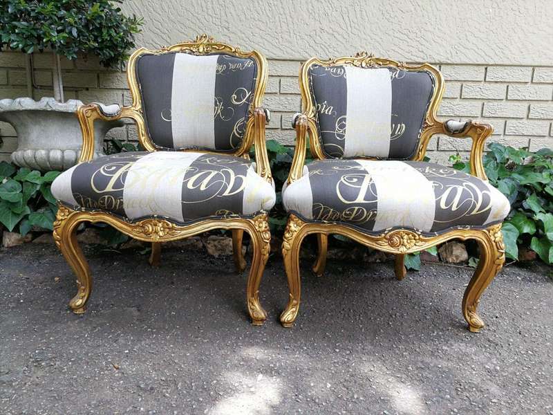 A Pair Of Carved And Gilded French Louis XV Chairs