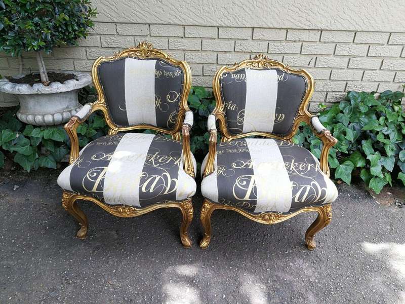 A Pair Of Carved And Gilded French Louis XV Chairs