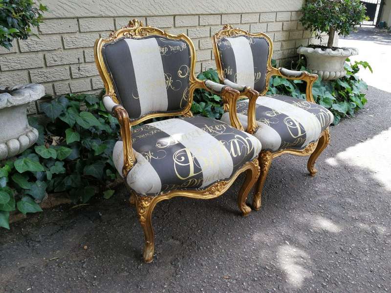 A Pair Of Carved And Gilded French Louis XV Chairs
