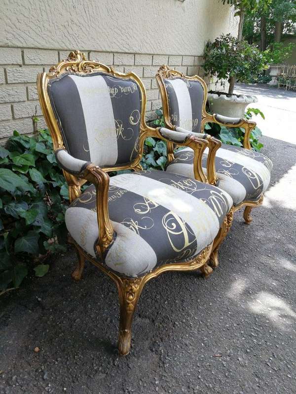 A Pair Of Carved And Gilded French Louis XV Chairs