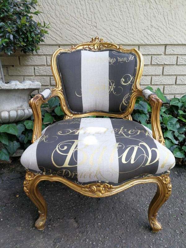 A Pair Of Carved And Gilded French Louis XV Chairs