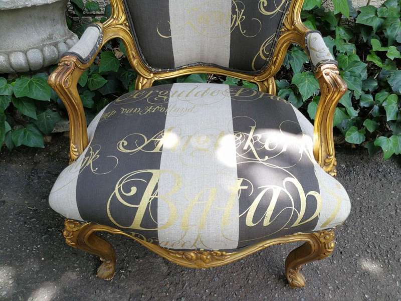 A Pair Of Carved And Gilded French Louis XV Chairs