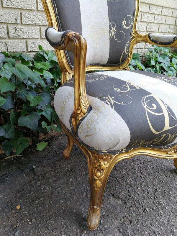 A Pair Of Carved And Gilded French Louis XV Chairs