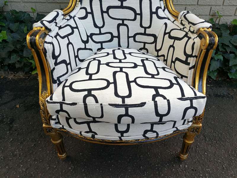 A Pair of Late 19th Century French Bergere Chairs Hand Gilded with Gold Leaf and Upholstered in i...