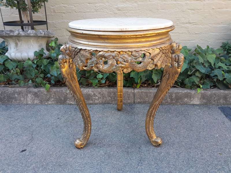 An Early 20th Century Carved and hand-gilded with gold leaf table with Marble Top