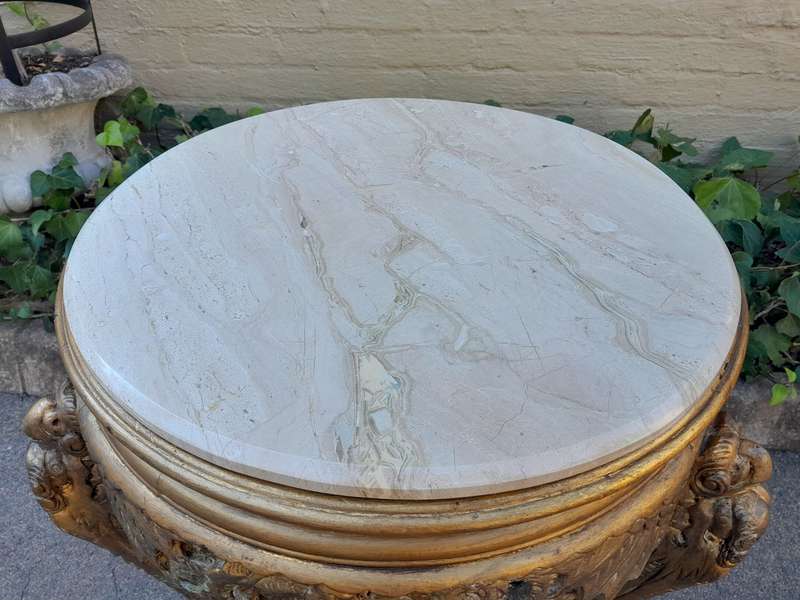 An Early 20th Century Carved and hand-gilded with gold leaf table with Marble Top
