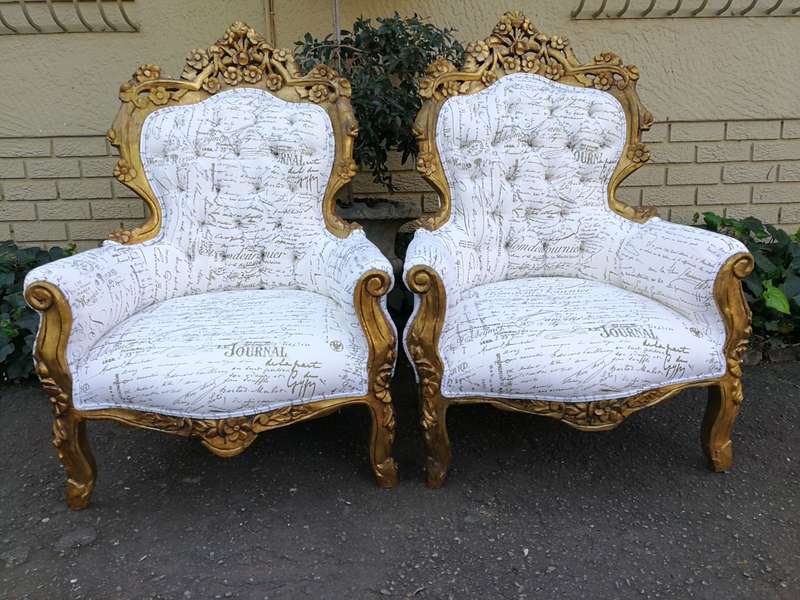 A Pair Of French Baroque Ornately Carved Gilded Arm Chairs Upholstered in an Exclusive and Custom...
