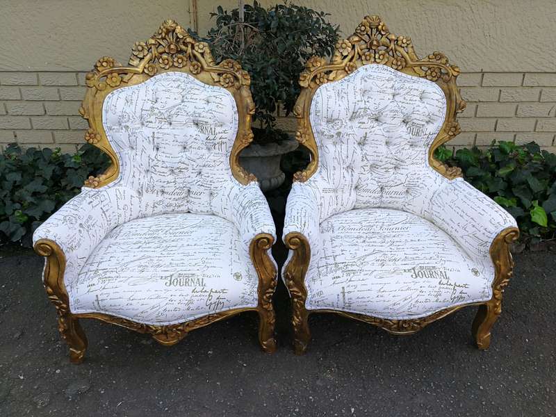 A Pair Of French Baroque Ornately Carved Gilded Arm Chairs Upholstered in an Exclusive and Custom...